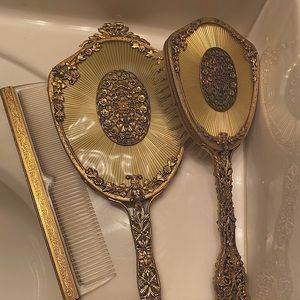 Vintage mirror and brush